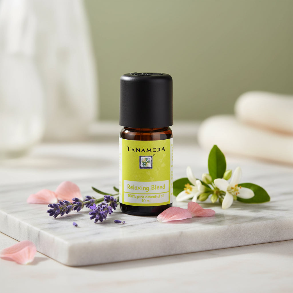 Tanamera Relaxing Blend essential oil in a 10 ml amber glass bottle with a black dropper cap and a yellow label.