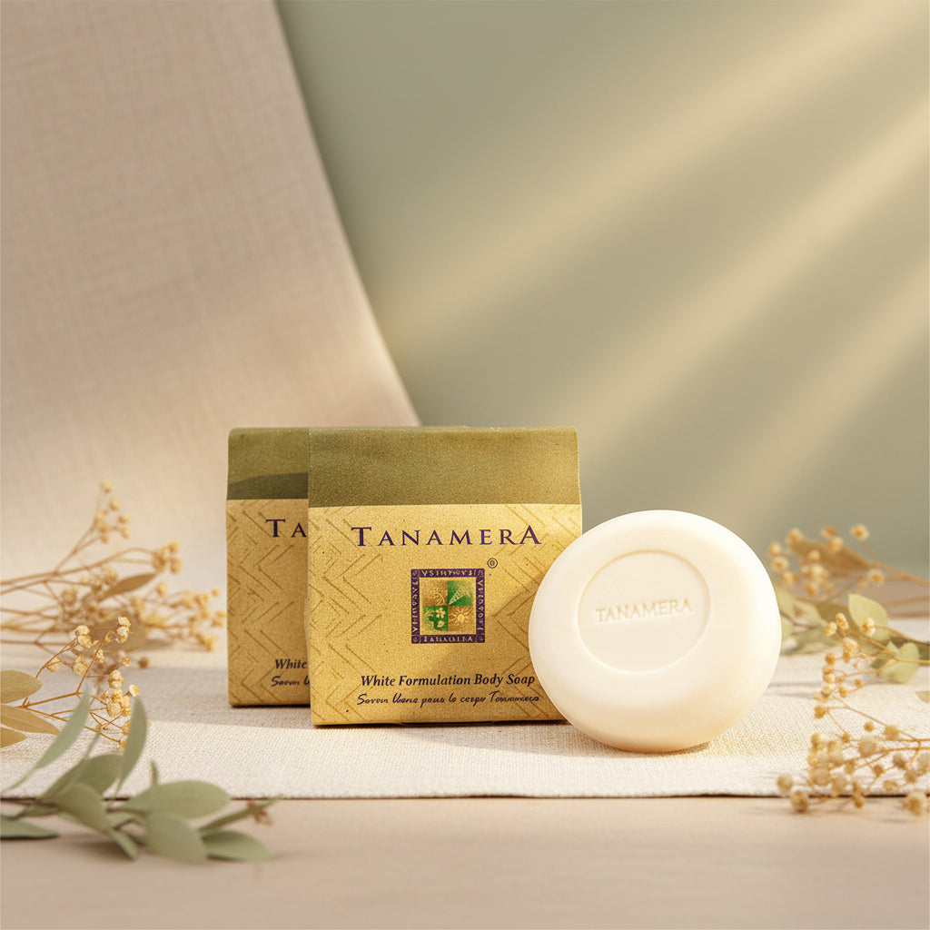 Packaging and bar of TANAMERA White Formulation Body Soap with descriptive text indicating moisturizing properties, suitability for dry skin.